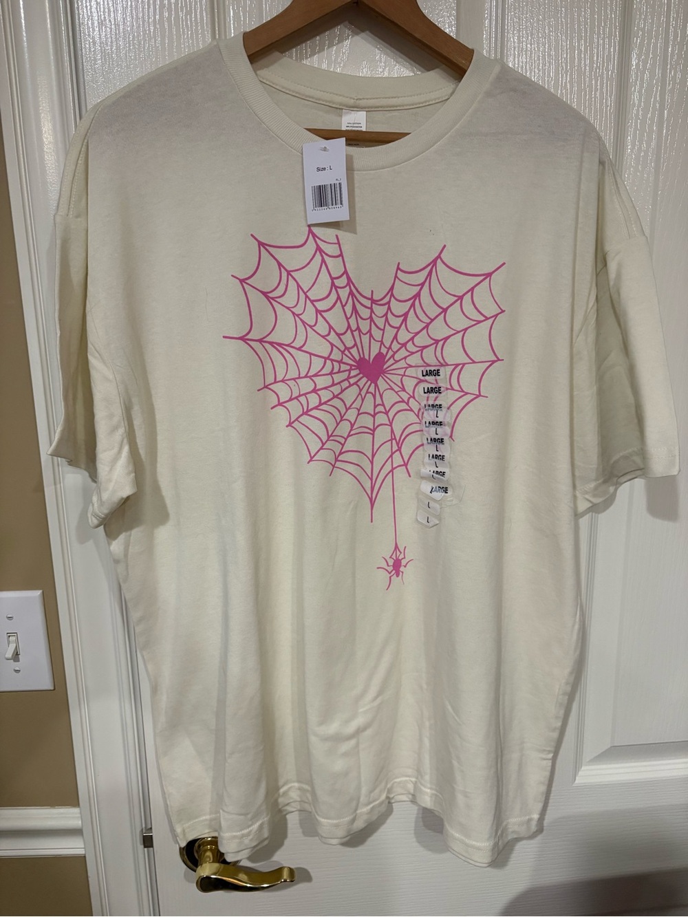 NWT- Cream Short Sleeve Tee with Pink Spiderweb Graphic